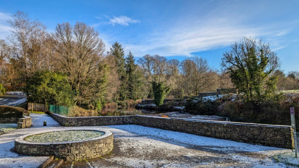 Waterfall area at Lover's Retreat with a dusting of snow day after Storm Eowyn in Omagh