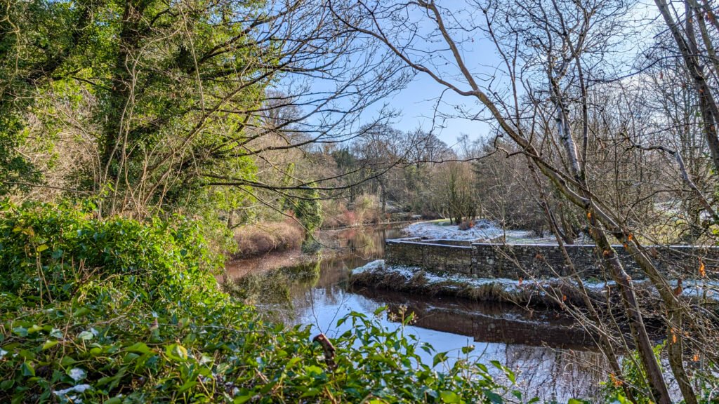 View of river at Lover's Retreat with a dusting of snow day after Storm Eowyn in Omagh