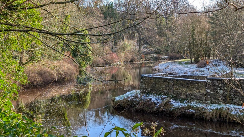 View of river at Lover's Retreat with a dusting of snow day after Storm Eowyn in Omagh