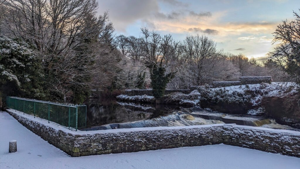 Lovers Retreat waterfall area covered in snow