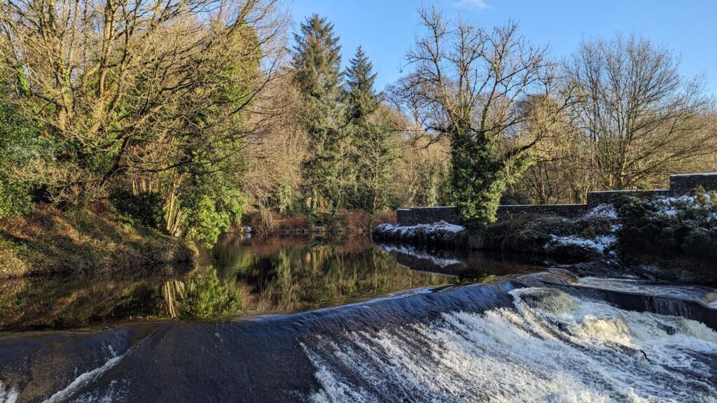 Lovers Retreat waterfall with the snow thawed from the trees in the afternoon sun