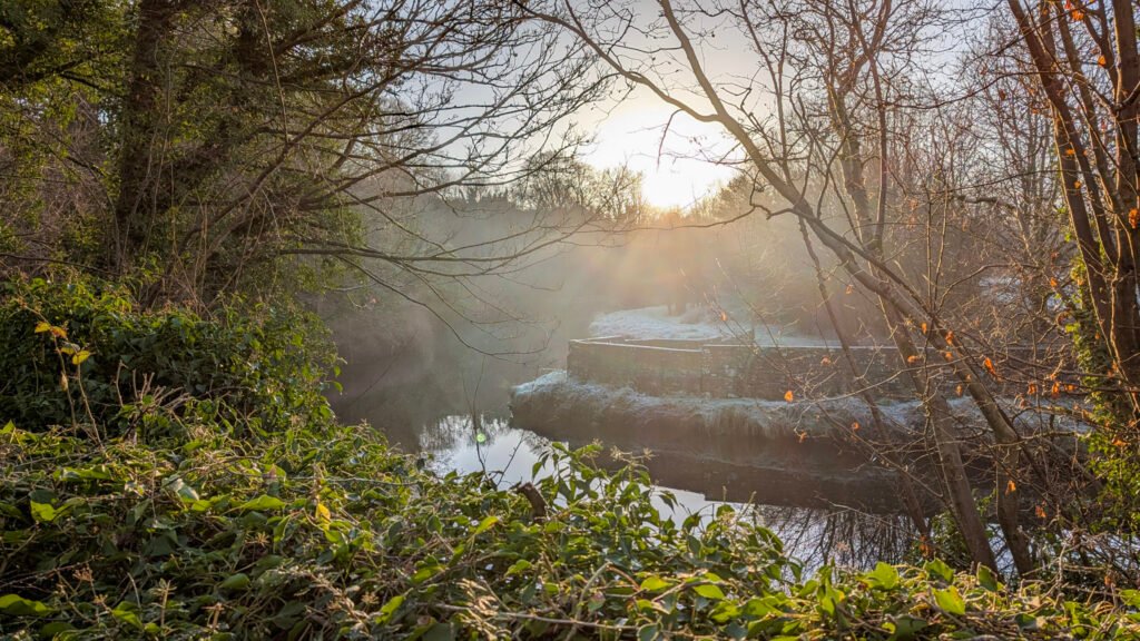 Corner above the waterfall view of river at lovers retreat omagh. Frosty sunrise.