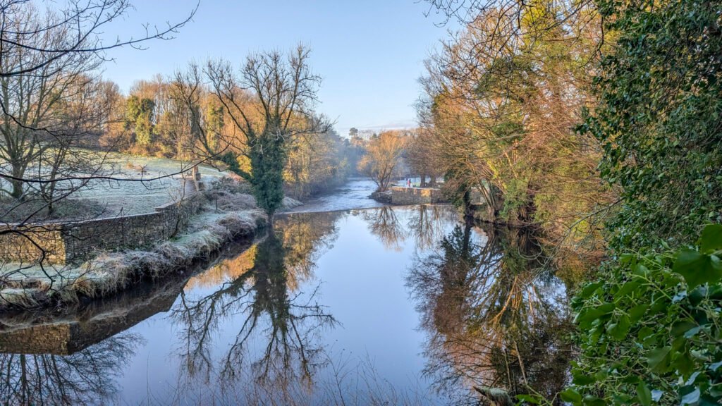 Above the waterfall view of river at lovers retreat omagh. Frosty sunrise.